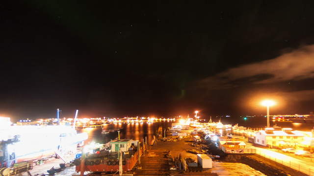 Polarlichter im Alten Hafen Reykjavík - Nacht Tag Zeitraffer Download