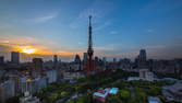 Zeitraffer - Tokio Tower Tag-Nacht Sonnenuntergang